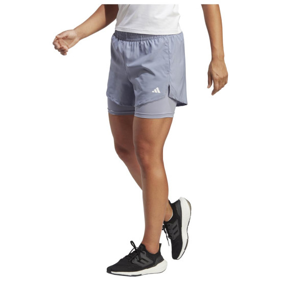 Adidas Γυναικείο σορτς Minimal 2in1 Adidas Γυναικείο σορτς Minimal 2in1